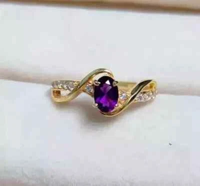 Anillo de compromiso para mujer de amatista creada en laboratorio de corte ovalado de 2 quilates enchapado en oro amarillo de 14 quilates Foto 1 de 4