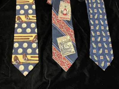 3 corbatas de cuello novedosas con temática de golf de Tabasco, Land's End y A Rogers Foto 1 de 4