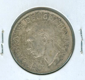 CANADA 1951 FIFTY CENT COIN-UNCIRCULATED--SILVER--TONED - Picture 1 of 2