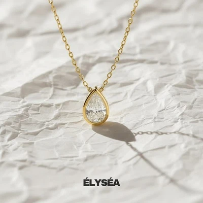 Collar de oro amarillo de 14 k con colgante de diamantes cultivados en laboratorio en forma de pera de 1 quilate certificado F/VS Foto 1 de 4