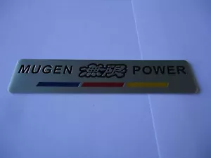 EMBLEMA INSIGNIA MALETERO GUARDABARROS LATERAL DE COCHE MUGEN PLATA - Imagen 1 de 2