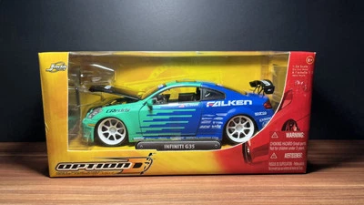 JADA TOYS ESCALA 1:24 IMPORTACIÓN CORREDOR OPCIÓN D FALKEN 2003 INFINITI G35 CUPÉ CON CAJA Foto 1 de 4