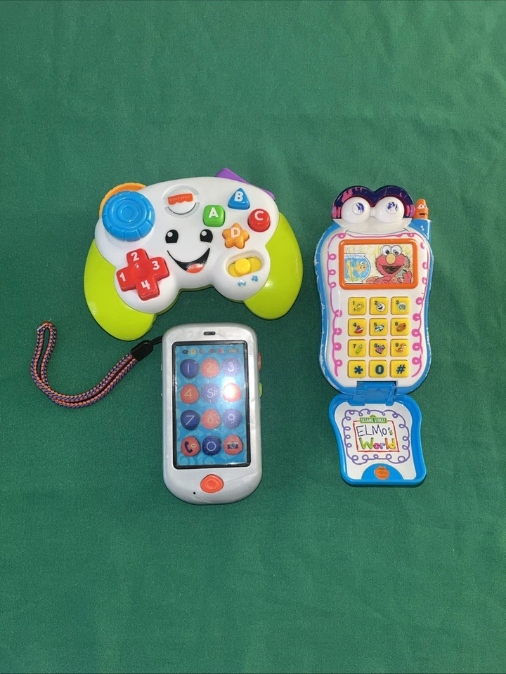 Juguetes telefónicos Sesame Street Elmo + B. Juguetes Teléfono Prentend y FP Control Remoto C. Foto 1 de 4