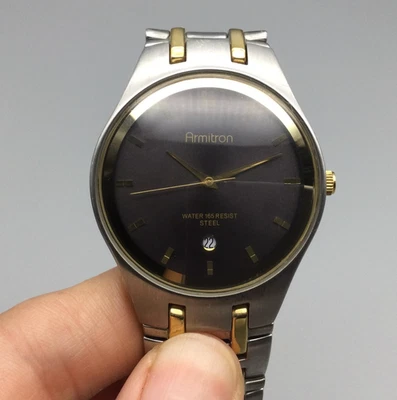 Reloj Armitron Hombre 36mm Dorado Plata Dos Tonos Fecha Esfera Negra Batería Nueva 6.25" Foto 1 de 4