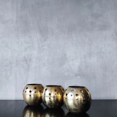 Trio of vintage large cast brass celestial punched star tea light candle holders - Image 1 of 4