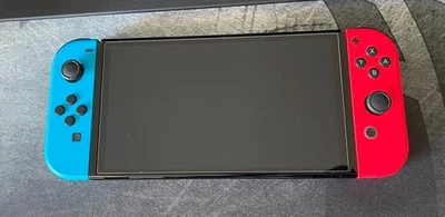 Nintendo Switch OLED Bundle – Joy-Cons + OEM Accessories + Orzly Travel Case - Image 1 of 4