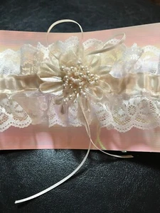 NEW WEDDING GARTER, FROM LOCAL WEDDING SHOP, NOW CLOSED. MANY LISTED.(GRY-99-31) - Picture 1 of 2