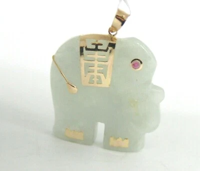 COLGANTE ELEFANTE JADE NATURAL ORO AMARILLO 14K CON RUBÍ ROJO. 26MM Foto 1 de 4
