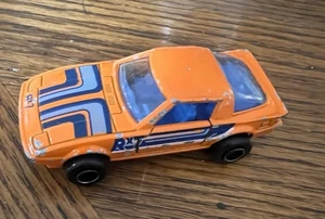 Coche diecast naranja Majorette Mazda RX-7 puertas abiertas de Francia **pérdida de pintura - Imagen 1 de 10