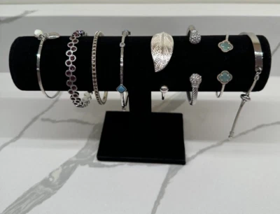 Lot of 8 Elegant Silver Tone Bracelets - Image 1 of 4