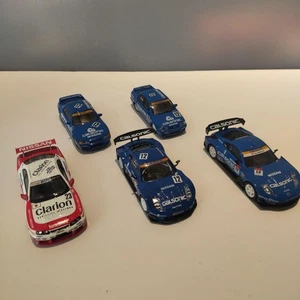 Kyosho Nissan Rennwagen 1/64 5er Set - Bild 1 von 10