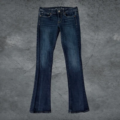 Pantalones de mezclilla ajustados American Eagle con bolsillo de lentejuelas elásticos lavado oscuro talla 8 largos Foto 1 de 4