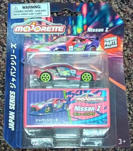 Majorette - Japan Serie - Nissan Z - pink und grün mit Tuningteilen auf Karte - Bild 1 von 1
