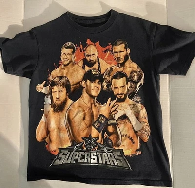 Camisa WWE Superstars Juvenil 10/12 Foto 1 de 3