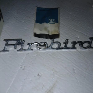 NOS OEM GM 1971-1981 PONTIAC FIREBIRD EMBLEM FRONT FENDER ORIGINAL 486904 - Picture 1 of 3