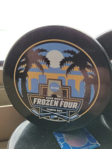 2023 NCAA Mens Frozen Four Logo Hockey Puck Tampa Bay Minnesota Michigan Boston Cover