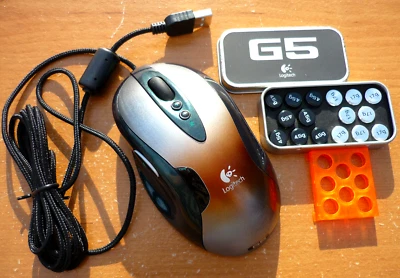Logitech G5 Laser Gaming Mouse M-UAC113 831411-1000 - Metallic Green & Rust - Image 1 of 4
