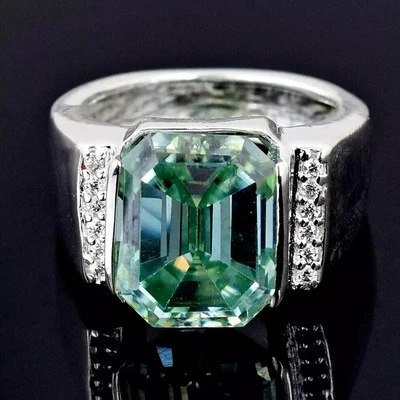 RARO anello in argento 925 con diamanti blu trattati taglio smeraldo 4,50... - Immagine 1 di 4