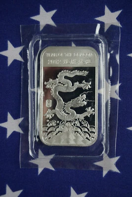 Barra de plata maciza fina APMEX Año del Dragón 2012 sin circular 1 oz .999 EE. UU. Foto 1 de 4