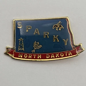 North Dakota goldfarbene Emaille Cowboy funkelnde Anstecknadel Staat Souvenir Vintage - Bild 1 von 3