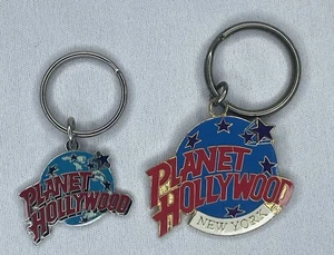 Set 2 portachiavi vintage Planet Hollywood New York metallo smaltato - Foto 1 di 3