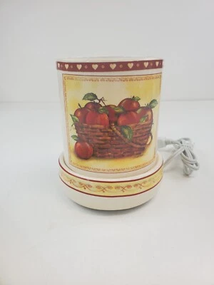 Aquecedor elétrico de velas decorado pela Apple - Imagem 1 de 4