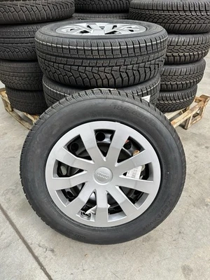 Original Audi A1 GB Winterräder 15 Zoll 185/65 R15 88T DOT22 NEU  mit Radkappen - Bild 1 von 4