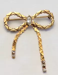 Vintage signierte Avon goldfarbene und Kristall Strass baumelnde Schleife Brosche - Bild 1 von 3