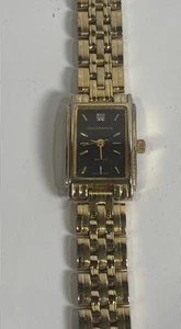 Reloj Damas Tono Dorado Diamante A7-01 33069K Vintage Cara Negra Batería Nueva Usado en Excelente Condición - Imagen 1 de 8