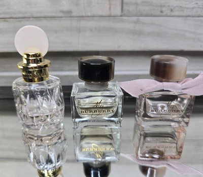 2 bottles My Burberry Splash and one bottle Mini Miu Miu L'eau Rosee 0.17 oz. - Image 1 of 2