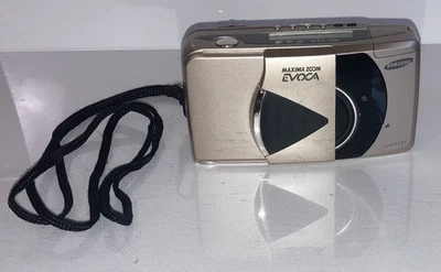 Cámara fotográfica SAMSUNG Máxima Zoom Evoca 38-115 mm 1:4,1 AF panorámica 35 mm Foto 1 de 4