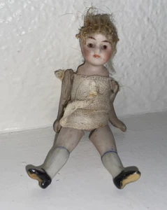"Muñeca Antigua Todo Bisque Articulado Marrón Vidrio Ojos 3 1/2" - Imagen 1 de 3