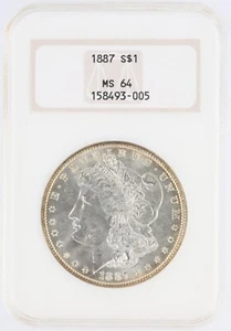 Dólar de plata Morgan 1887 NGC MS64 S$1 Philadelphia acuñado sin precio base - Imagen 1 de 4