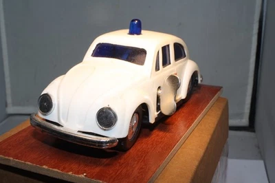 Ambulancia Volkswagen Beetle años 60 cuerda hecha en Hong Kong Foto 1 de 4