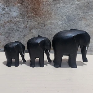 Handgeschnitzte schwarze Holz Elefanten Figuren 3er Set - Bild 1 von 10