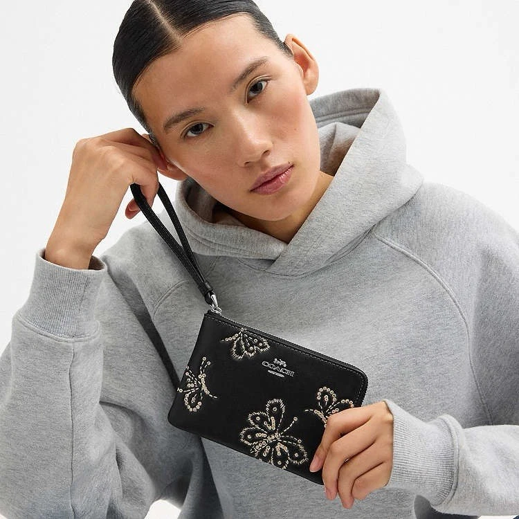 Coach Corner Zip Wristlet Black Leather with Sparkly Butterflies . .