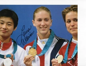 US OLYMPIC DIVER LAURA WILKINSON SIGNED GOLD MEDAL 8X10 - Picture 1 of 1