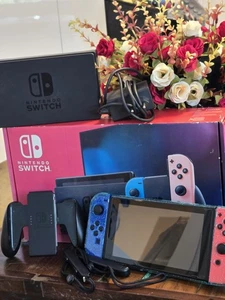 Nintendo Switch mit Joy-Con - Neon-Rot/Neon-Blau +Spiel(Überraschung.)+Schutz - Bild 1 von 11