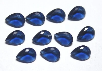 Лот 10 шт. созданная в лаборатории грушевидная синяя иолитовая проволока обернутая граненая 3x10x14 мм - Изображение 1 из 4
