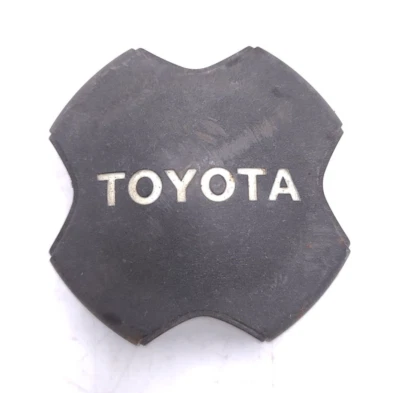 Toyota Tercel 91-97 Corolla 96-02 Wheel Center Cap Black Genuine OEM - Image 1 of 4