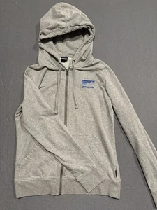 Sudadera con Capucha Patagonia Para Mujer Talla Pequeña Gris Jaspeado Logo Gráfico Bolsillo - Imagen 1 de 7