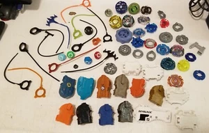 Konvolut Beyblades und Zubehör! Metall, Leucht, Reißverschlussschnüre + mehr - Bild 1 von 10