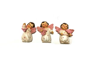 Stock 10 Bomboniere Angioletto rosa Magnete in resina assortite cm.5,3 (5964) - Foto 1 di 1