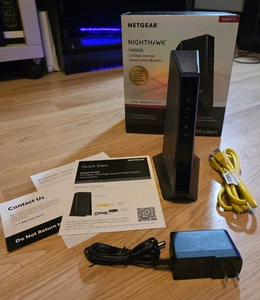 Modem câble NETGEAR CM2000 Nighthawk DOCSIS 3.1 + lot réseau NETGEAR - Photo 1/20