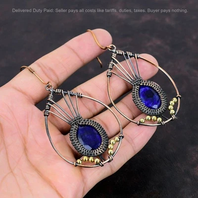 Pendientes colgantes únicos envueltos en alambre de piedra de zafiro azul ovalado joyería cobre Foto 1 de 4