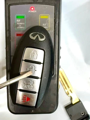 OEM 2006-2010 INFINITI M35 M45 smart keyless car entry remote key fob CWTWBU735 - Image 1 of 4
