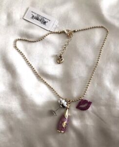 Betsey Johnson Gold Tone Going All Out Charm Necklace Champagne & Lips NWT