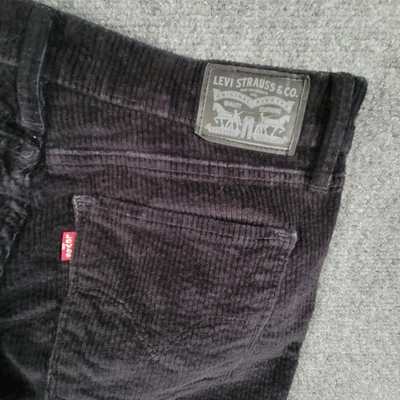 Pantalones Levi's para mujer 31 negros 721 tiro alto ajustados pana elásticos L30 5 bolsillos Foto 1 de 4