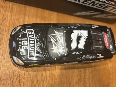 MATT KENSETH. 2003 SMIRNOFF ICE TRIPLE BLACK FORD TAURUS. AUTOGRAPHED 1:24  - Image 1 of 4