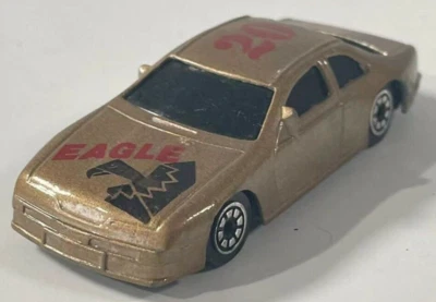 Coche diecast Road Champs West Caldwell 1992 - Eagle 20 dorado Foto 1 de 4